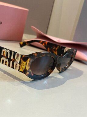 Miu Miu glasses